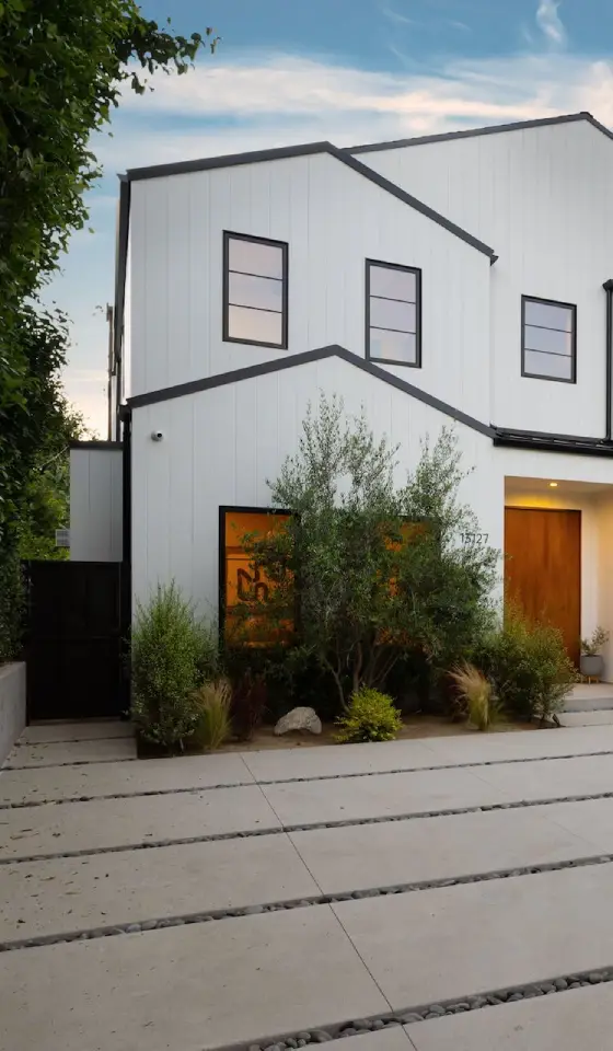 modern white house exterior with wooden accents 2024 10 30 12 49 08 utc.webp